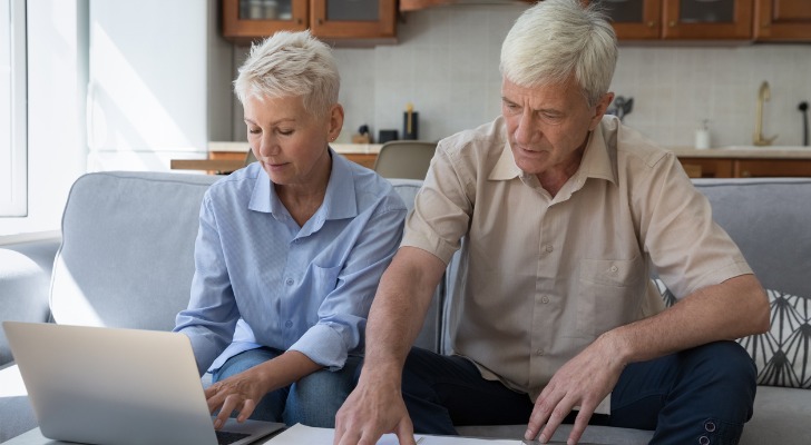 A couple researching how to deduct property taxes on their tax return.