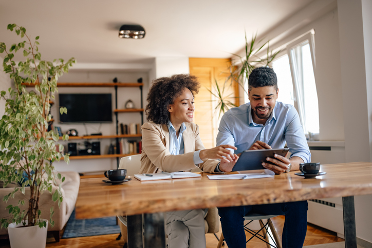 Homeowners reviewing the terms of their insurance.