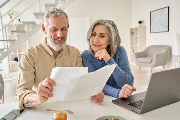 A couple reviewing their retirement plan.
